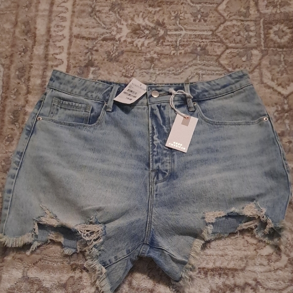 Good American Pants - Good American Light Blue Distressed Denim Shorts